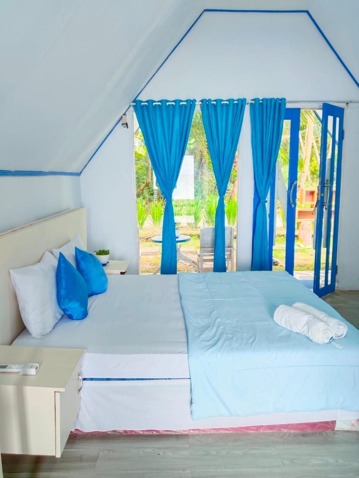 Tria Maria Cottage Ngurbloat ภายนอก รูปภาพ